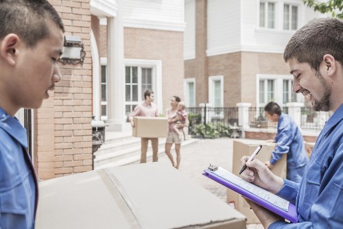 Professional house removals in Clapham with moving boxes and transport