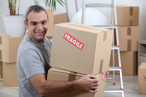 Removal van and moving boxes in Clapham street