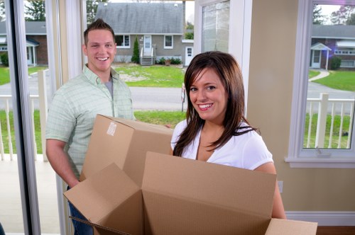 Careful packing materials used for fragile items during a Clapham move