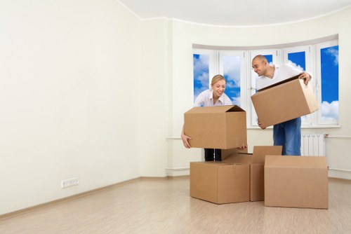 Removal team preparing furniture for a move in Clapham
