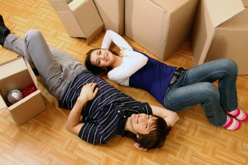 Packed moving boxes ready for flat removals in Clapham