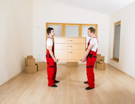 Careful loading of office furniture and equipment for transport